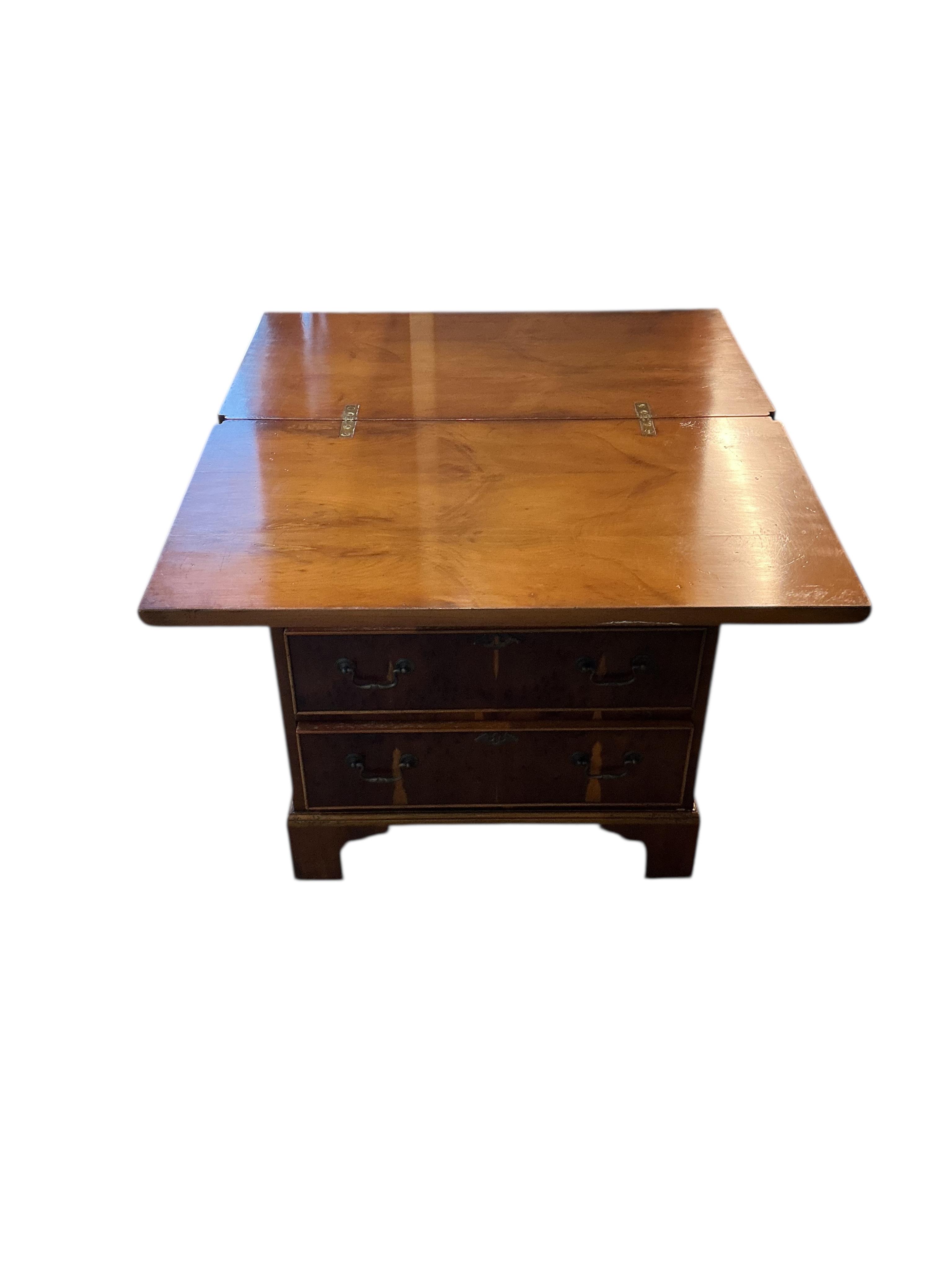 A small reproduction yew bachelor's chest, width 59cm, depth 34cm, height 76cm